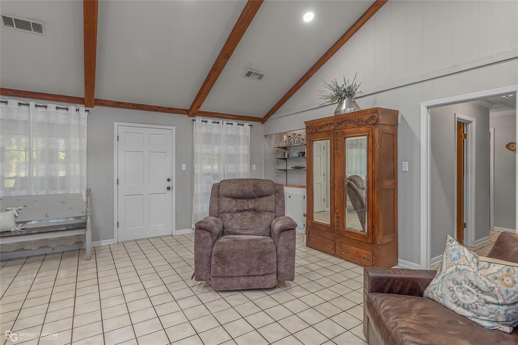 169 Fulbright Circle Minden, LA 71055 - Photo 19 of 38 a living room with furniture and a rug