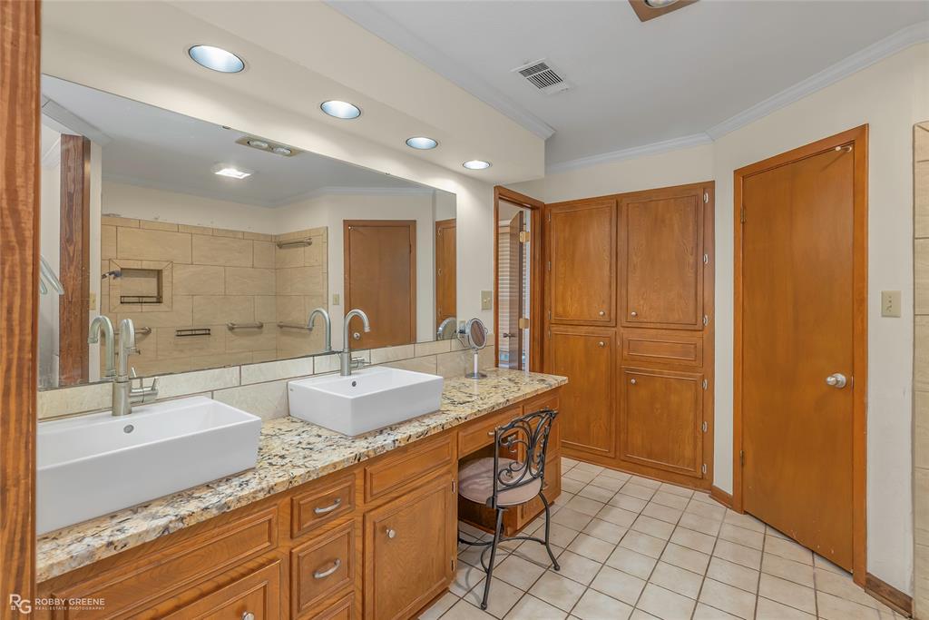 169 Fulbright Circle Minden, LA 71055 - Photo 28 of 38 a bathroom with a granite countertop sink mirror and double