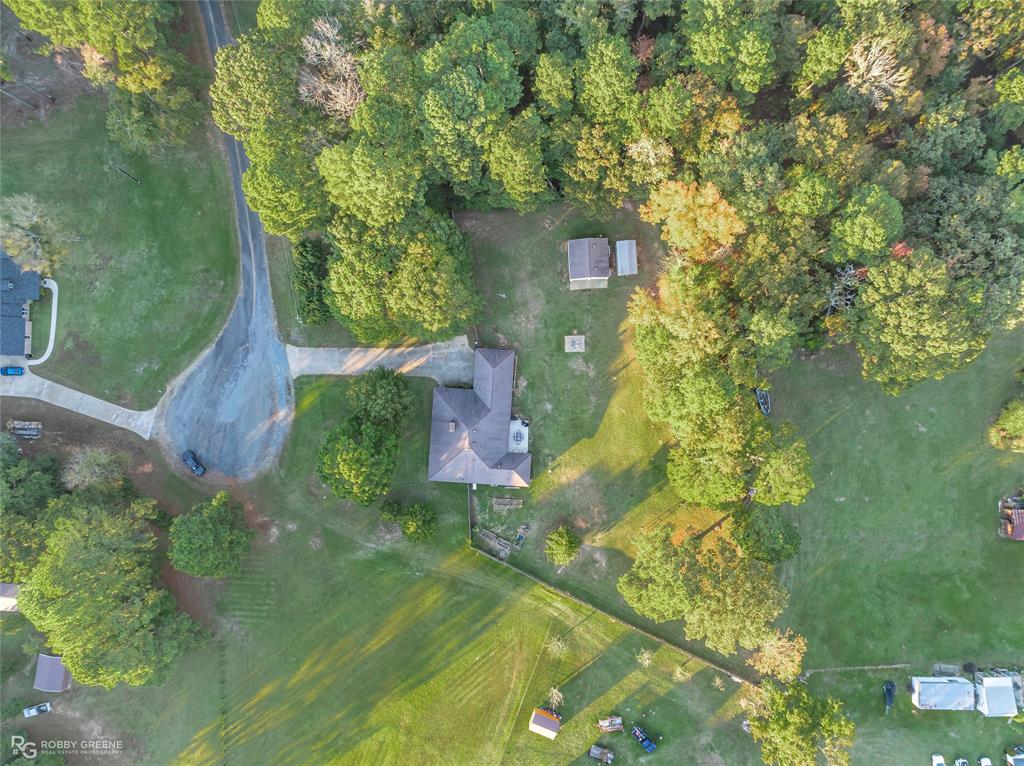 169 Fulbright Circle Minden, LA 71055 - Photo 7 of 38 a backyard of a house with lots of green space