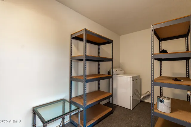 a view of staircase with a window