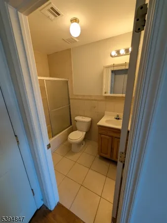 a bathroom with a sink and toilet
