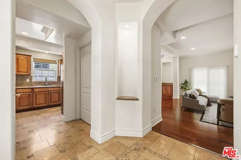a view of a living room and dining room