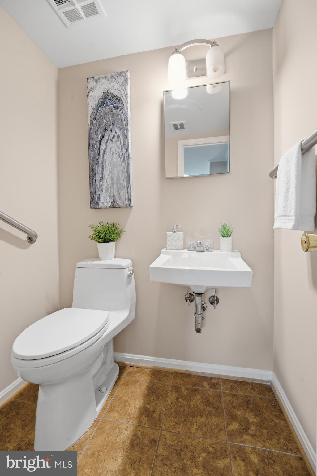 13309 Old Forge Road Silver Spring, MD 20904 - Photo 23 of 52 a bathroom with a sink toilet and a mirror