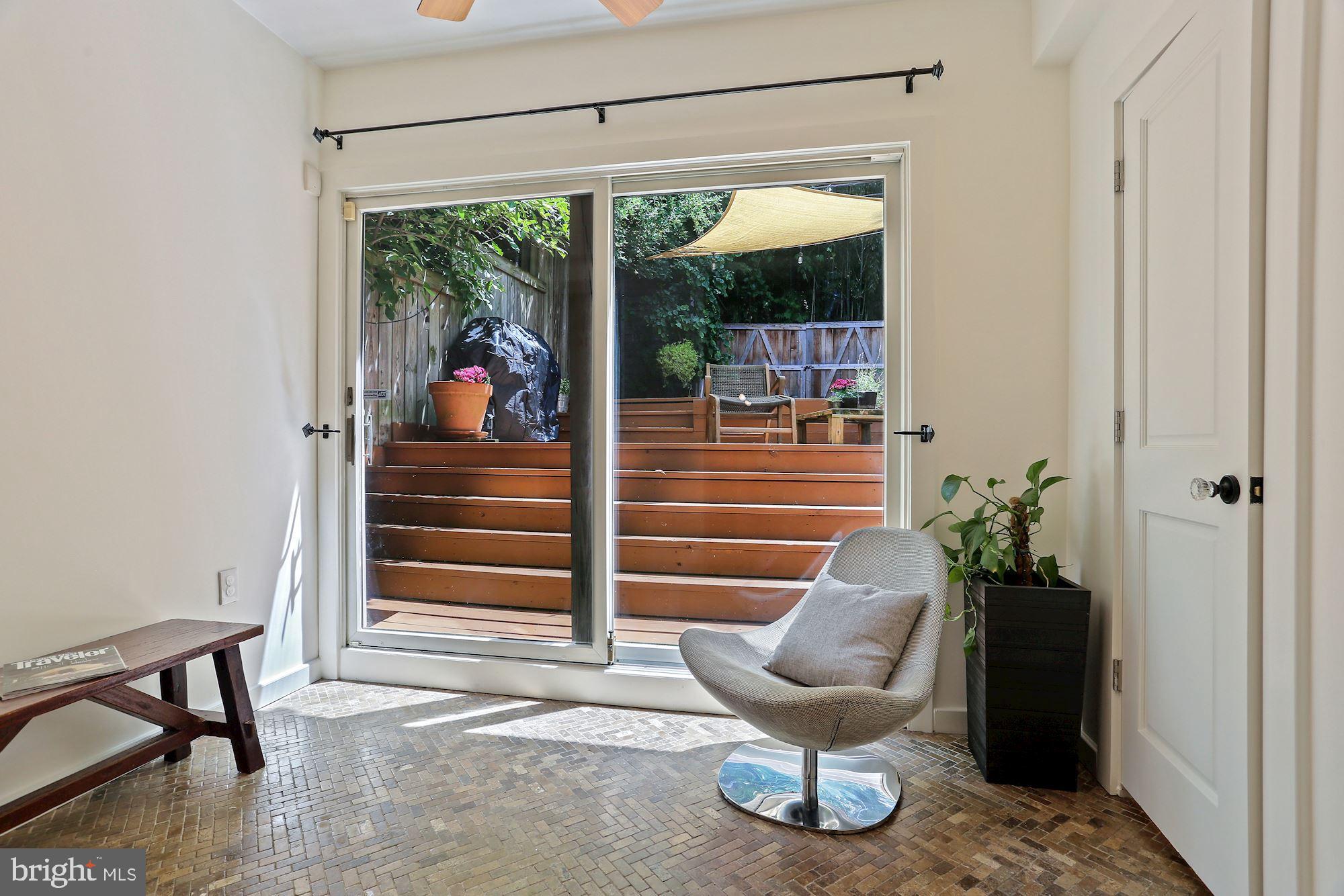 2037 37th Street Northwest Washington, DC 20007 - Photo 17 of 31 Den and view of rear patio