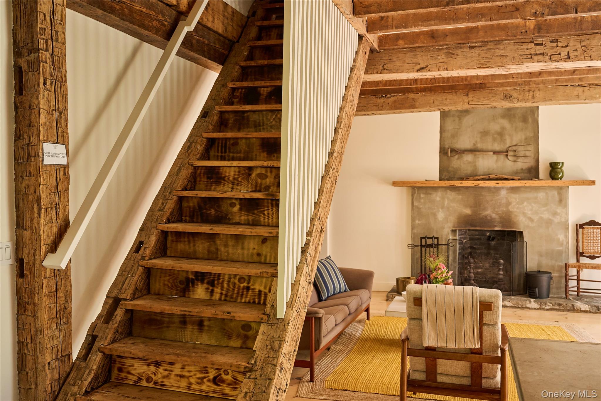 1883 Highway 213 Rifton, NY 12471 - Photo 19 of 48 Staircase with a high end fireplace and wood finished floors