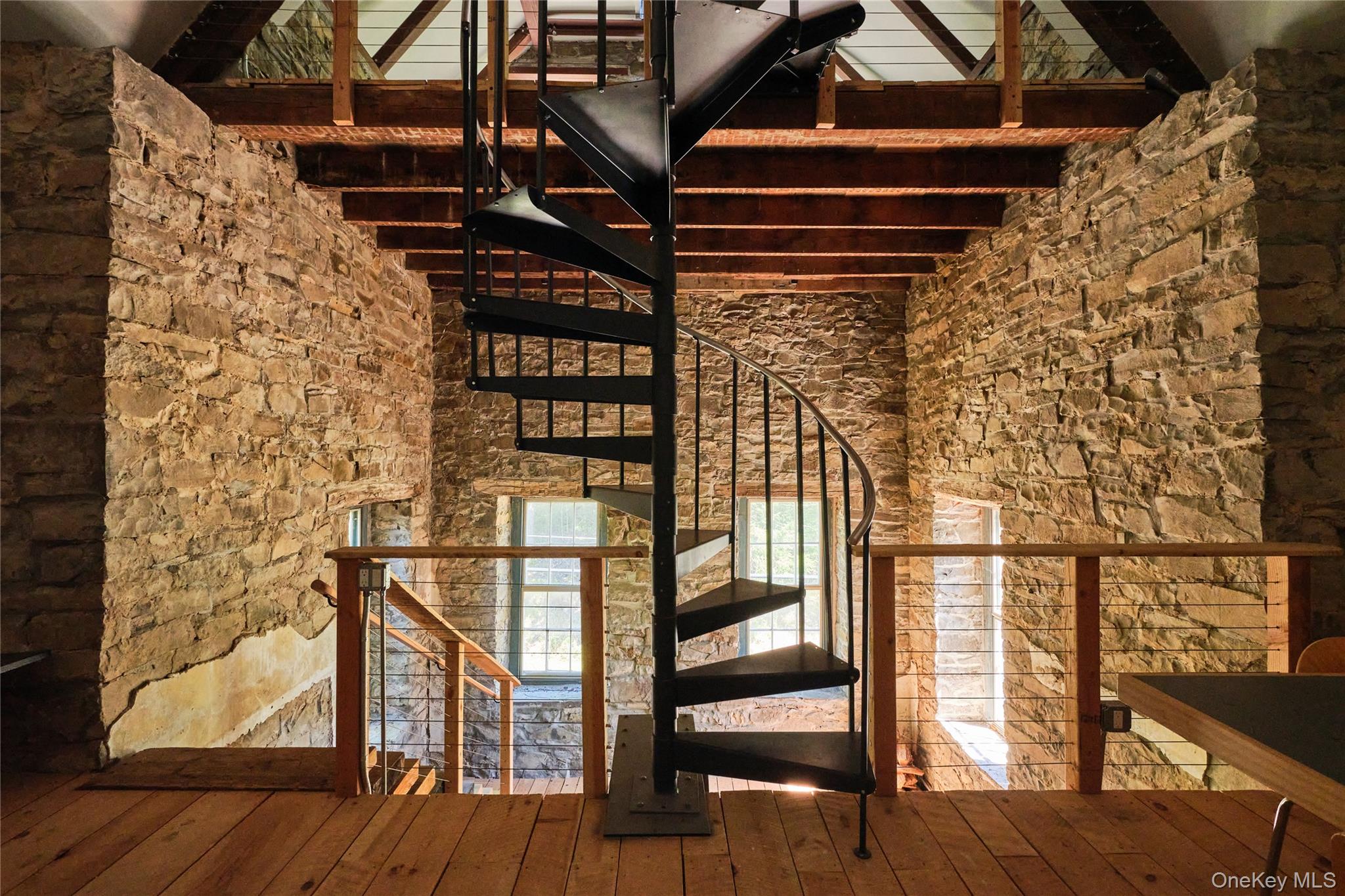 1883 Highway 213 Rifton, NY 12471 - Photo 40 of 48 Staircase featuring beamed ceiling, a towering ceiling, and wood-type flooring
