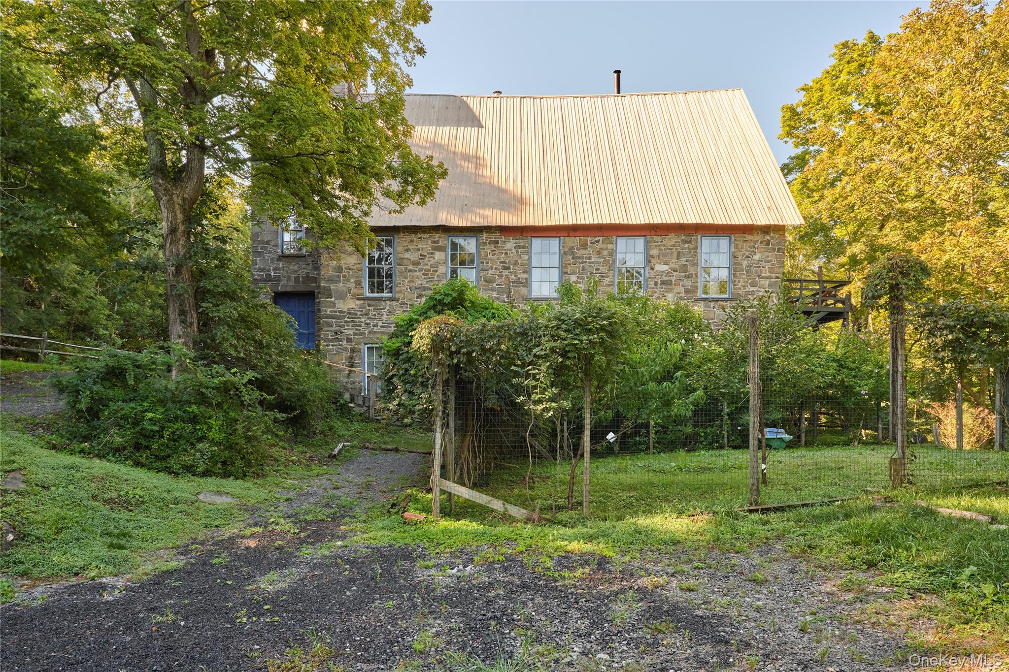 1883 Highway 213 Rifton, NY 12471 - Photo 47 of 48 Back of house featuring stone siding and a metal roof