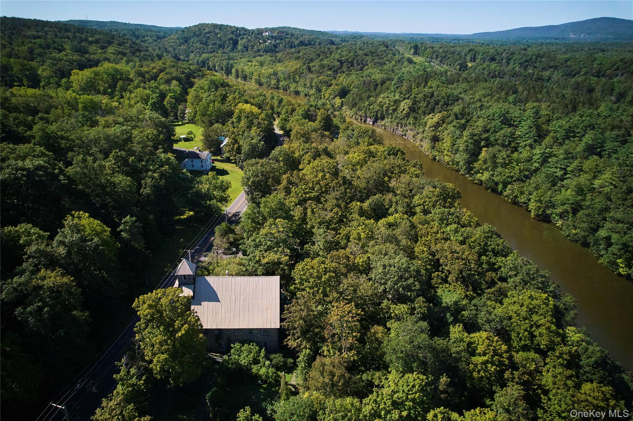 1883 Highway 213 Rifton, NY 12471 - Photo 48 of 48 Aerial view of property and surrounding area featuring a forest and a large body of water