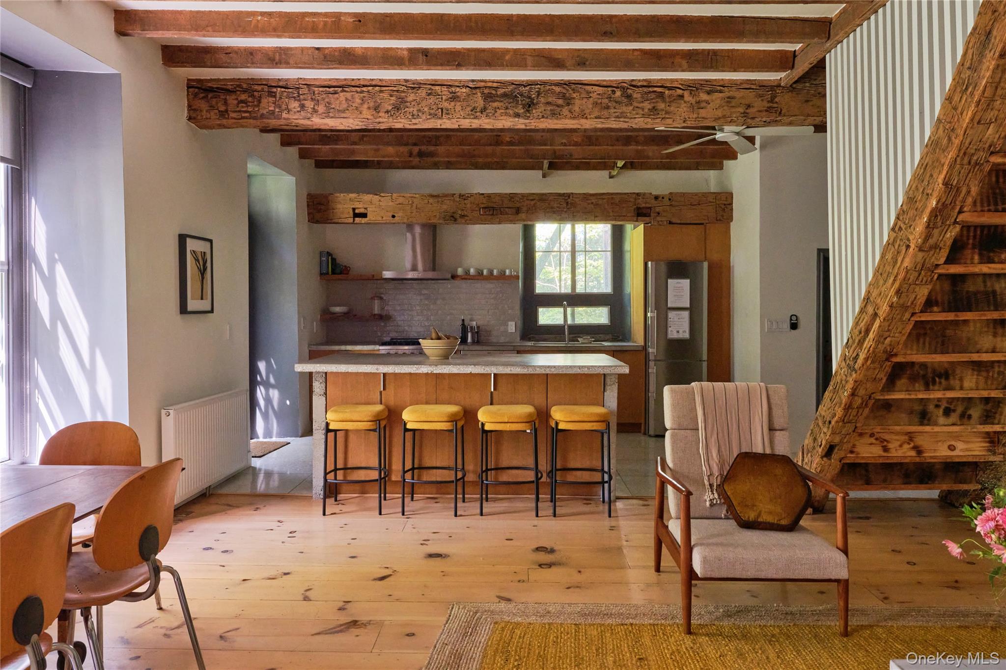 1883 Highway 213 Rifton, NY 12471 - Photo 6 of 48 Kitchen with light countertops, radiator heating unit, open shelves, beam ceiling, and freestanding refrigerator