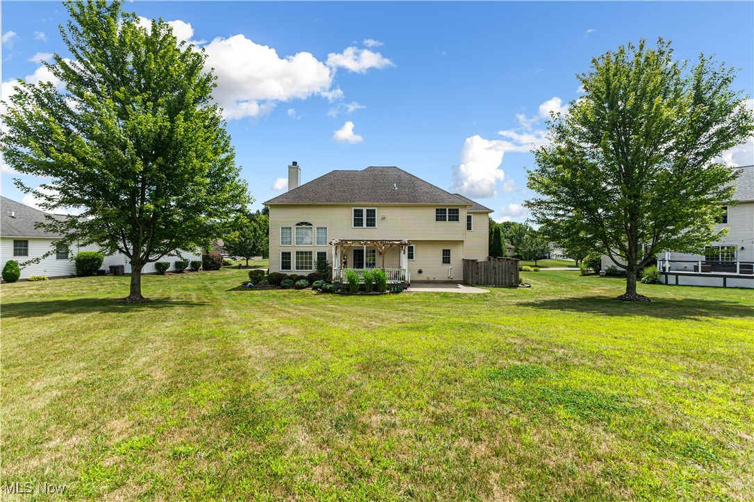2251 Timber Ridge Trail Streetsboro, OH 44241 - Photo 3 of 48 Rear view of property featuring a lawn and a patio area