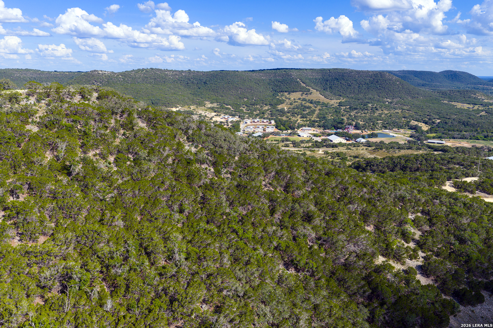 Lot 42 Walker Ridge Tarpley, TX 78003 - Photo 3 of 10 a view of a lake with mountains in the background