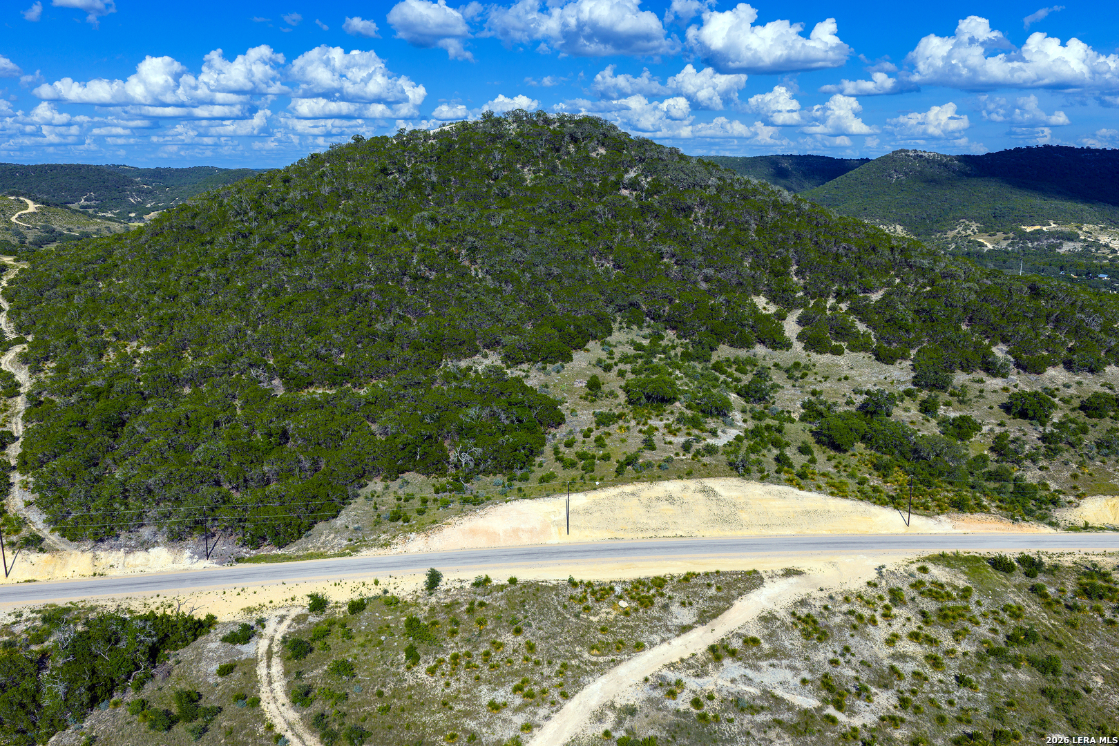 Lot 42 Walker Ridge Tarpley, TX 78003 - Photo 8 of 10 a view of a yard with an outdoor space