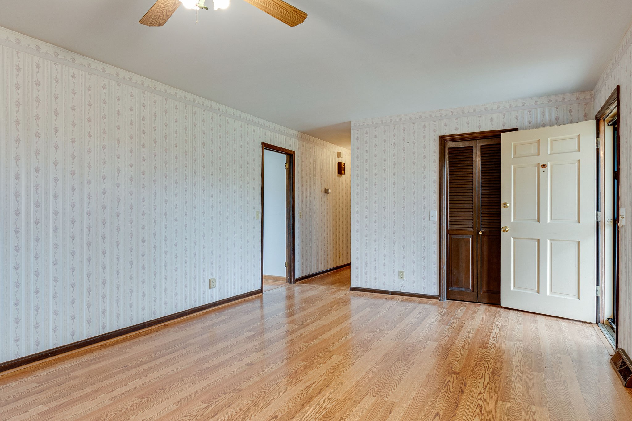 765 Lindsley Road Lebanon, TN 37090 - Photo 12 of 32 an empty room with wooden floor and windows