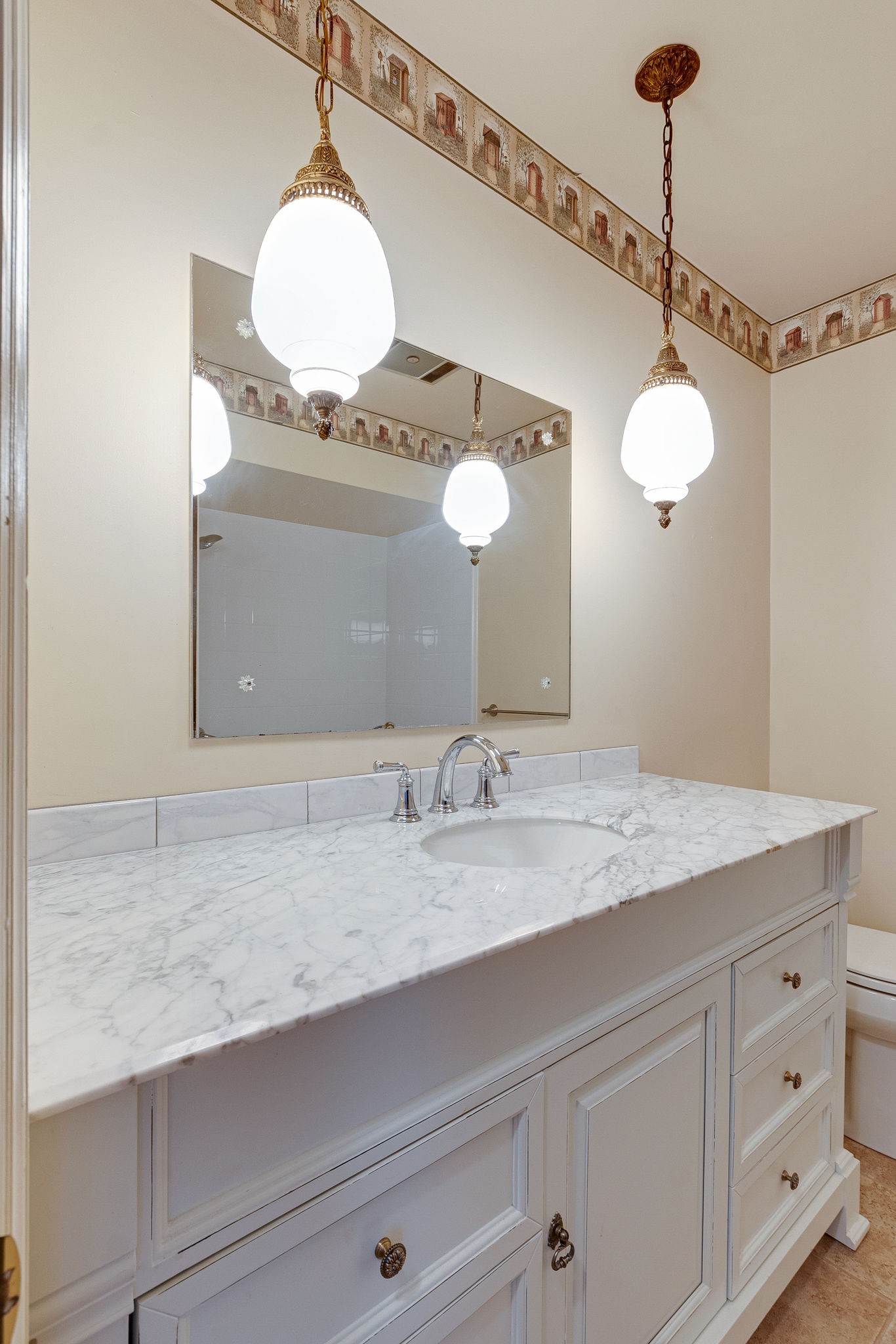765 Lindsley Road Lebanon, TN 37090 - Photo 20 of 32 a bathroom with a granite countertop sink a light fixture and a mirror