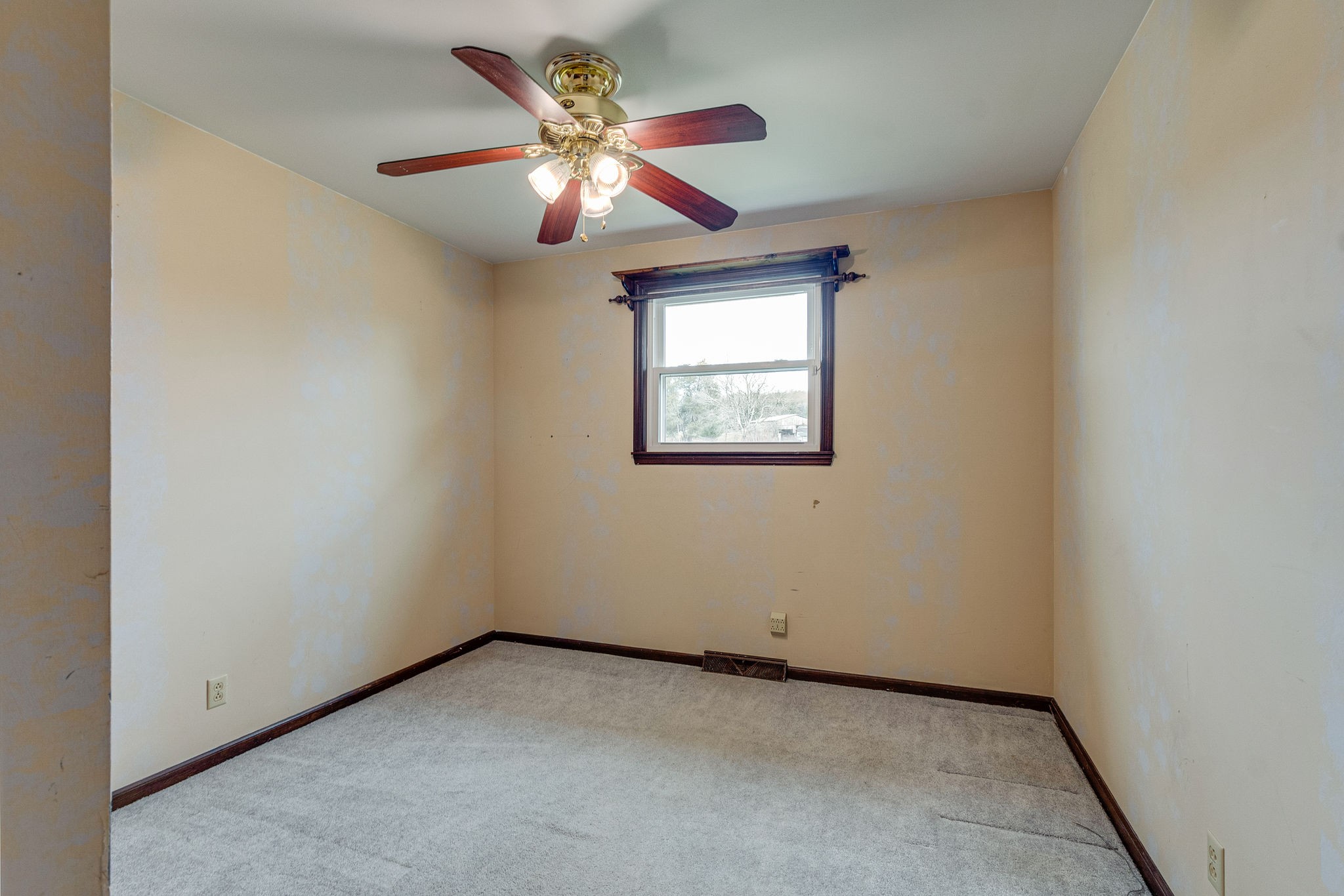 765 Lindsley Road Lebanon, TN 37090 - Photo 22 of 32 an empty room with chandelier fan and windows