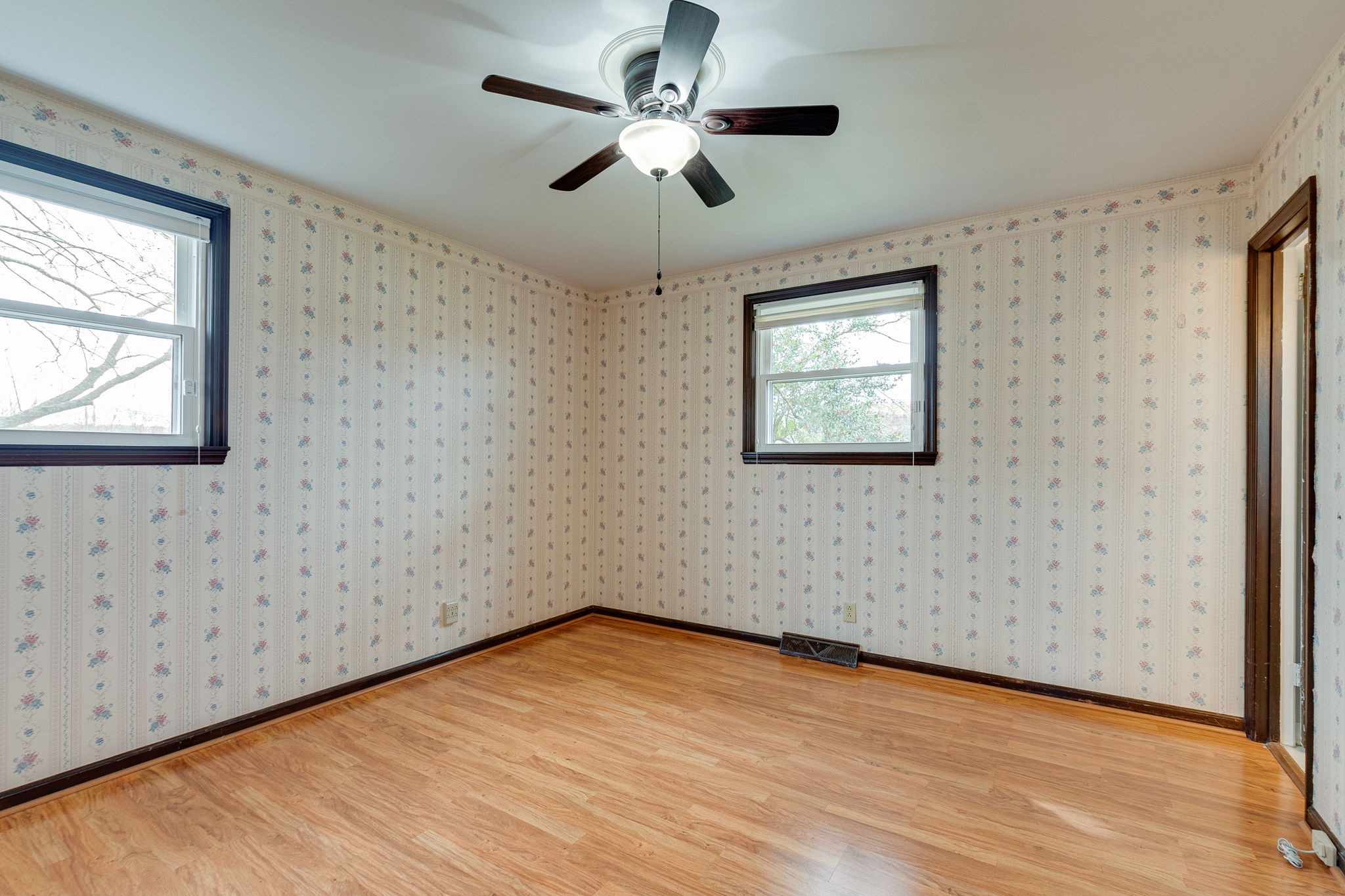 765 Lindsley Road Lebanon, TN 37090 - Photo 24 of 32 a view of empty room with wooden floor and fan
