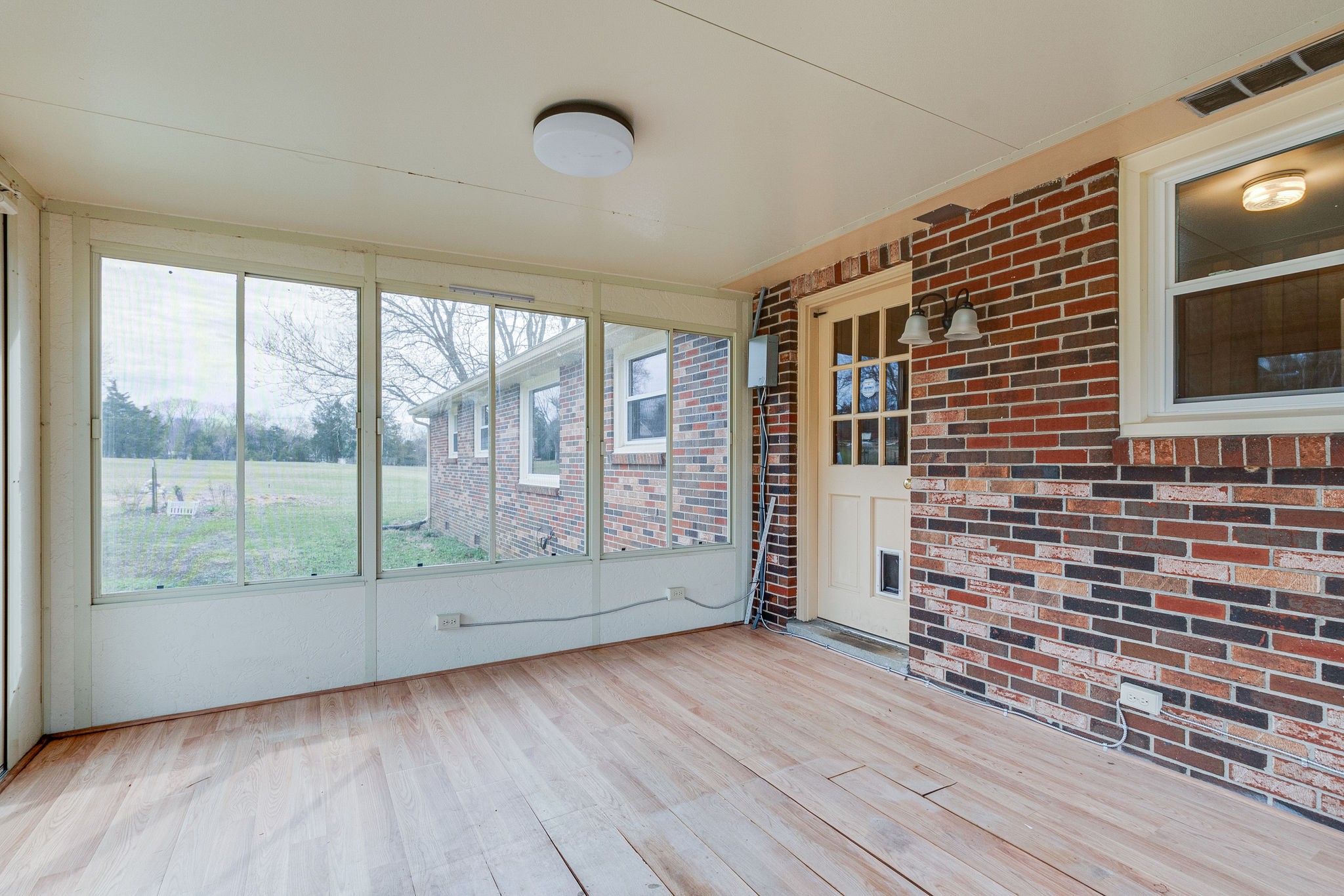 765 Lindsley Road Lebanon, TN 37090 - Photo 28 of 32 a view of empty room with wooden floor and fan