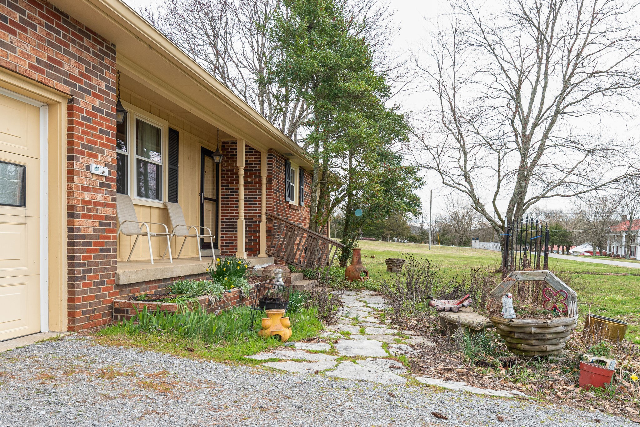 765 Lindsley Road Lebanon, TN 37090 - Photo 5 of 32 a front view of a house with garden