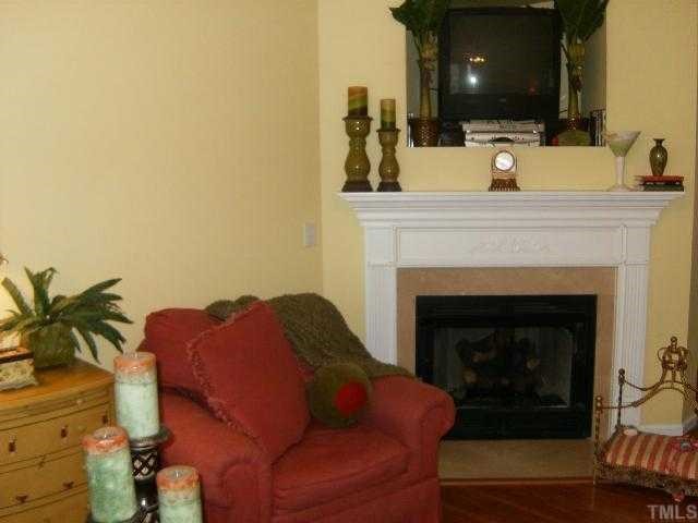 4433 Sugarbend Way Raleigh, NC 27606 - Photo 4 of 12 Living room Fire place