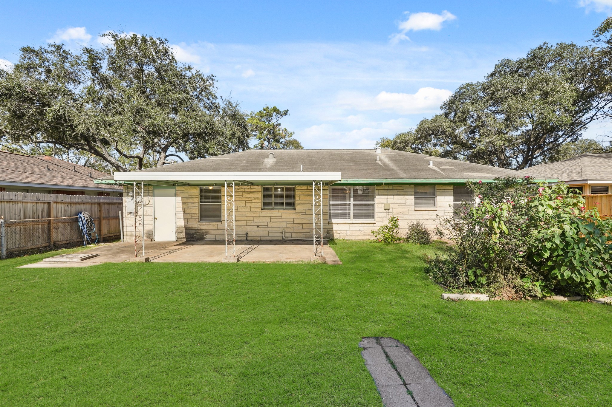 1207 Stonecrest Drive Houston, TX 77018 - Photo 6 of 34 a front view of a house with a yard and porch