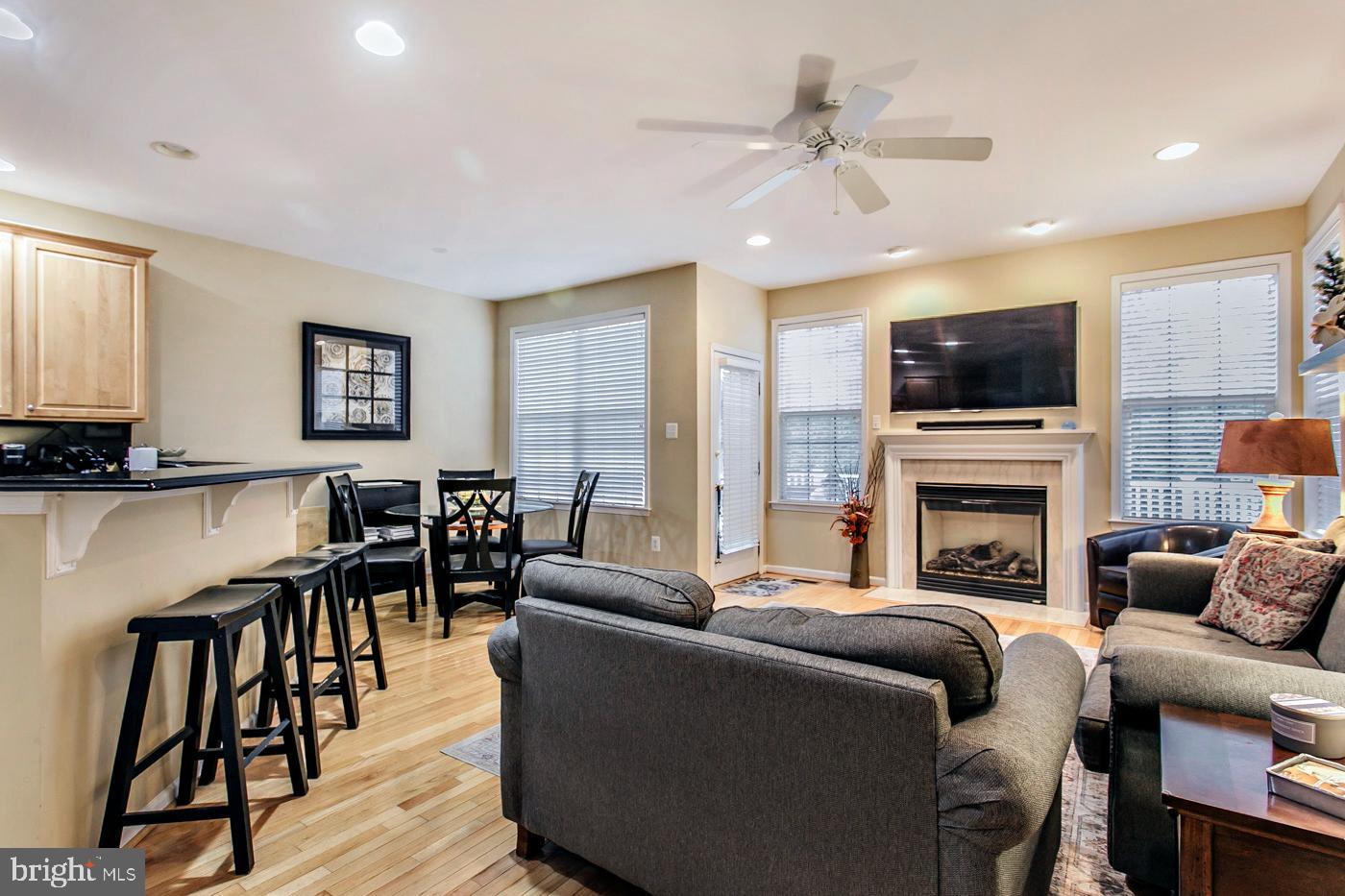 29 Eagle Road Phoenixville, PA 19460 - Photo 13 of 45 a living room with fireplace furniture and a flat screen tv