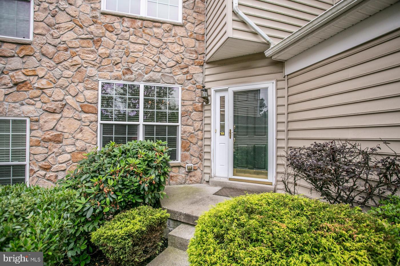 29 Eagle Road Phoenixville, PA 19460 - Photo 3 of 45 a front view of a house with a garden