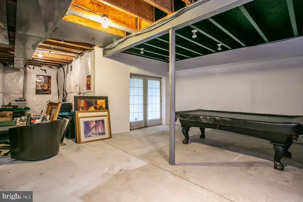 a view of a chairs and table in the patio