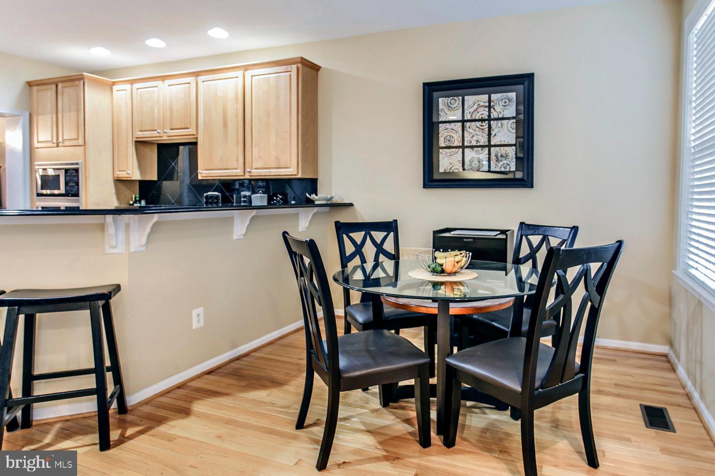 29 Eagle Road Phoenixville, PA 19460 - Photo 6 of 45 a view of a dining room with furniture and wooden floor