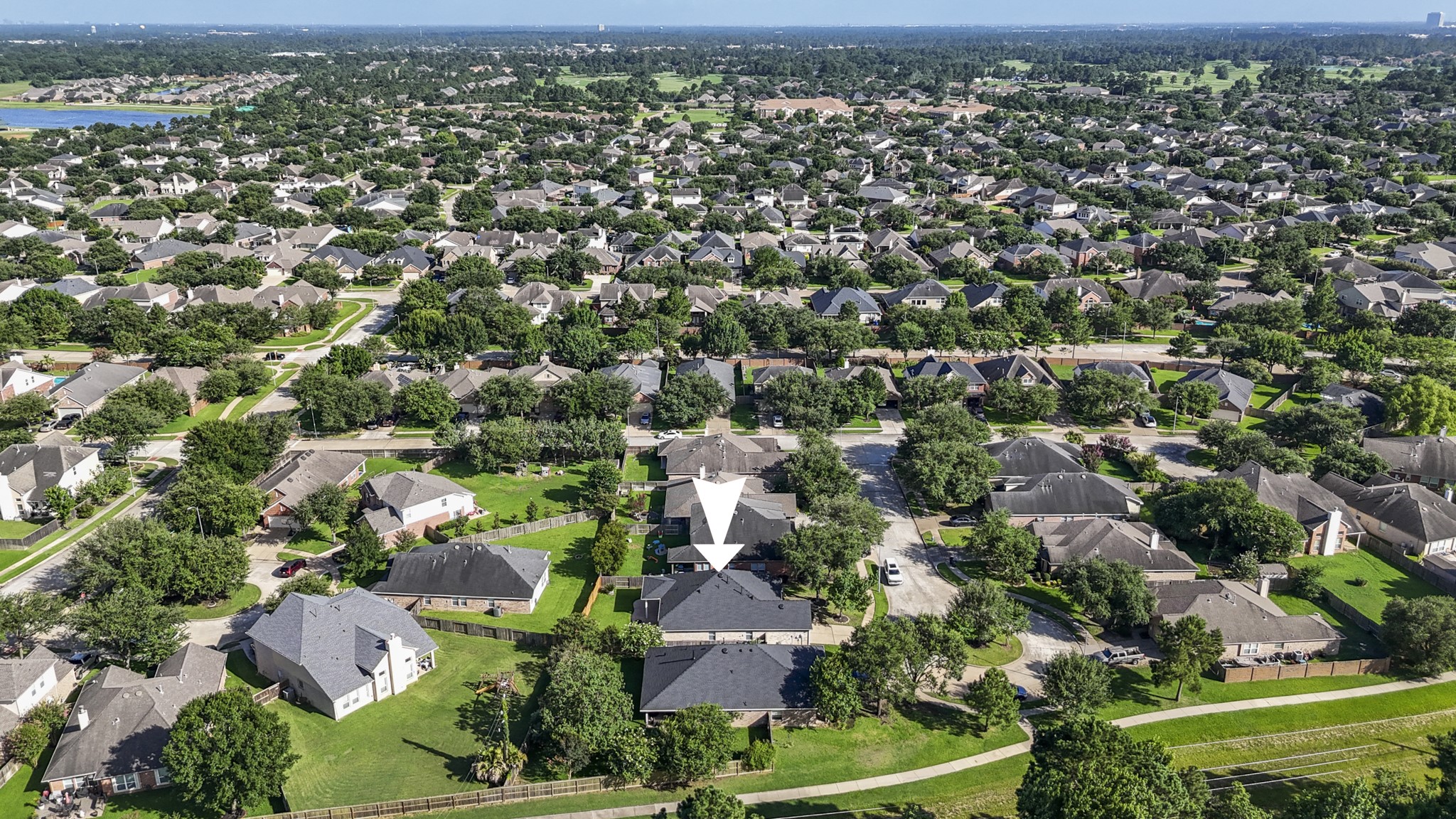 20014 Queens Oak Court Spring, TX 77379 - Photo 32 of 49 an aerial view of residential houses with outdoor space