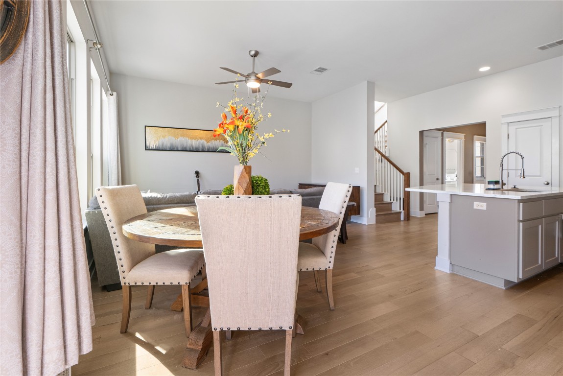 13001 Hymeadow Drive, Unit 31 Austin, TX 78729 - Photo 20 of 40 Dining space featuring stairway, light wood-style floors, ceiling fan, and recessed lighting