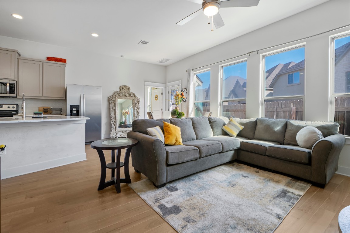 13001 Hymeadow Drive, Unit 31 Austin, TX 78729 - Photo 7 of 40 Living area with light wood-style floors, recessed lighting, and ceiling fan