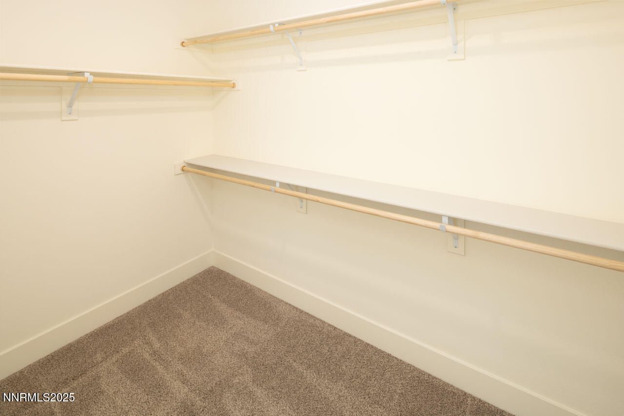 915 Saltbrush Road Dayton, NV 89403 - Photo 12 of 13 a view of a room with racks on the wall