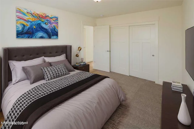 a spacious bathroom with a double vanity sink a mirror and shower
