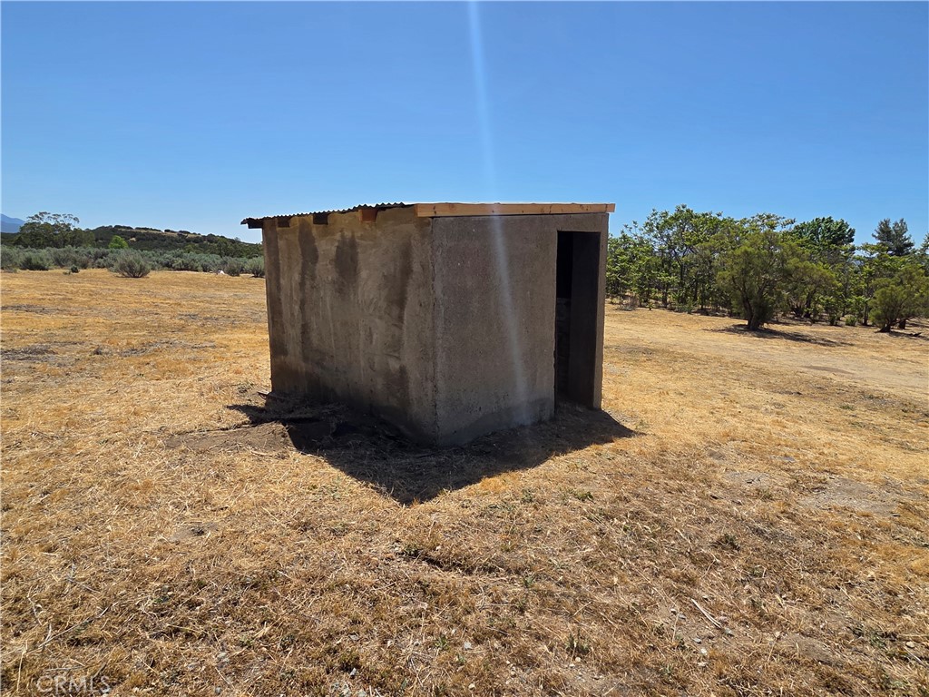 37230 Bautista Canyon Road Anza, CA 92539 - Photo 9 of 28 a view of a backyard of water and mountain view