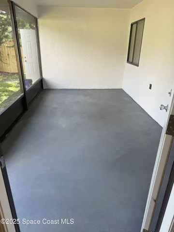 an empty room with window