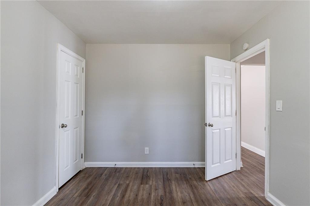 1255 Glen Forest Way Decatur, GA 30032 - Photo 11 of 23 a view of a room with wooden floor
