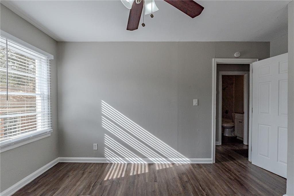 1255 Glen Forest Way Decatur, GA 30032 - Photo 14 of 23 a view of room with window and wooden floor