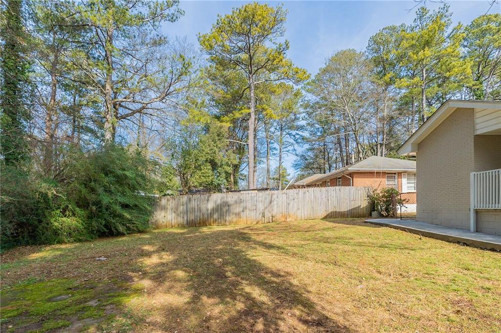 1255 Glen Forest Way Decatur, GA 30032 - Photo 19 of 23 a view of a house with a yard