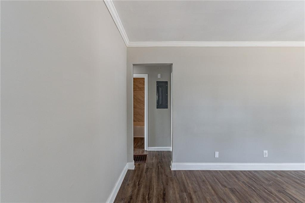 1255 Glen Forest Way Decatur, GA 30032 - Photo 8 of 23 a view of a small space with wooden floor and a window
