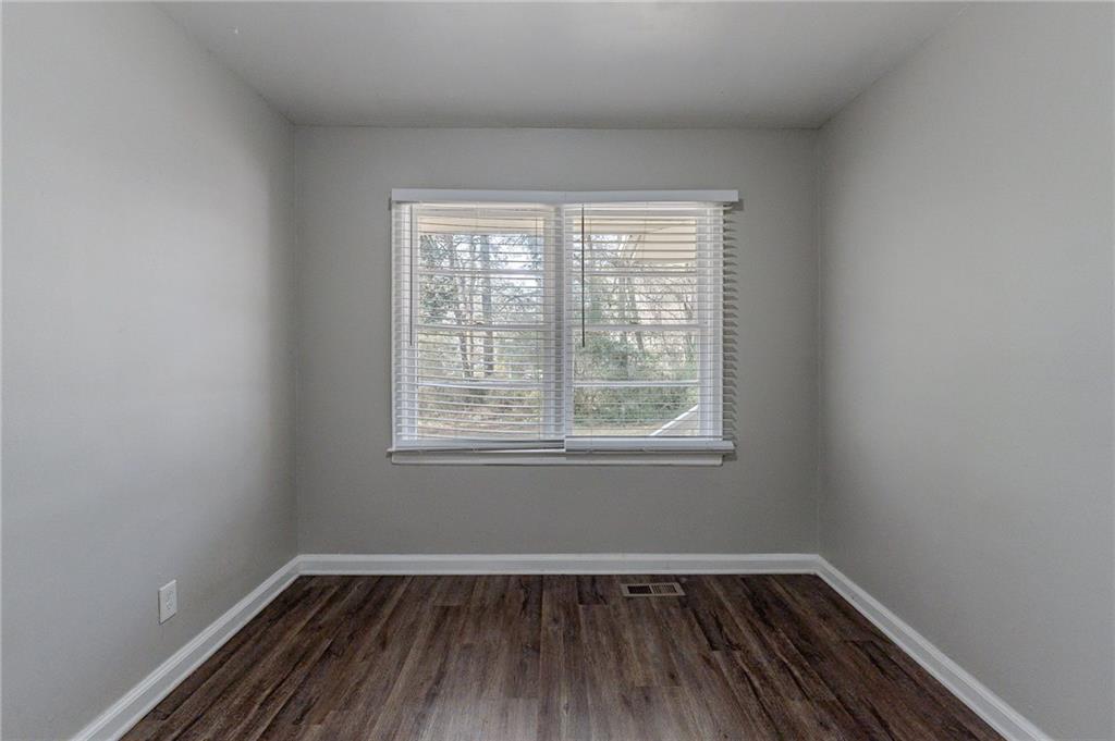 1255 Glen Forest Way Decatur, GA 30032 - Photo 10 of 23 an empty room with a window