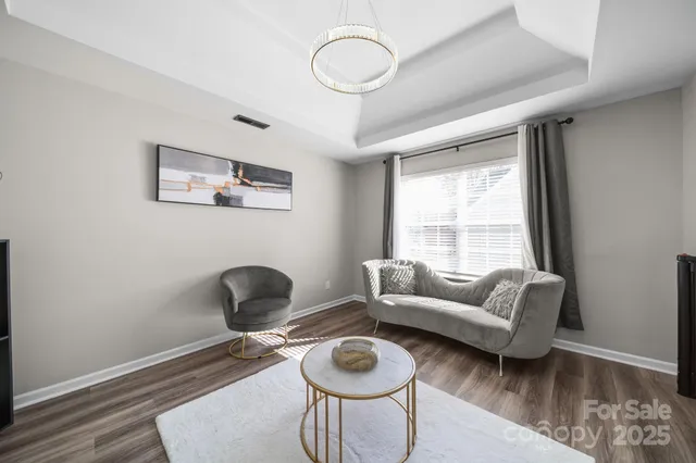 a spacious bathroom with a double vanity sink and a mirror
