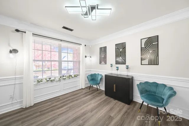 a spacious bathroom with double vanity and a bathtub