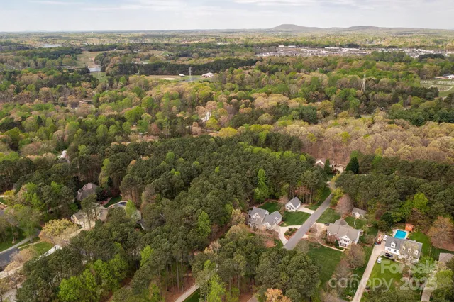 an aerial view of town with residential houses with outdoor space