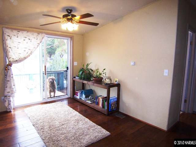 175 Aries Circle Reno, NV 89521 - Photo 4 of 13 a living room with furniture and a window