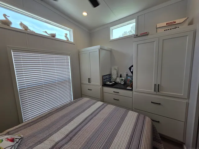 a kitchen with stainless steel appliances a refrigerator and cabinets