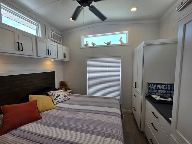 a bedroom with furniture and a fireplace