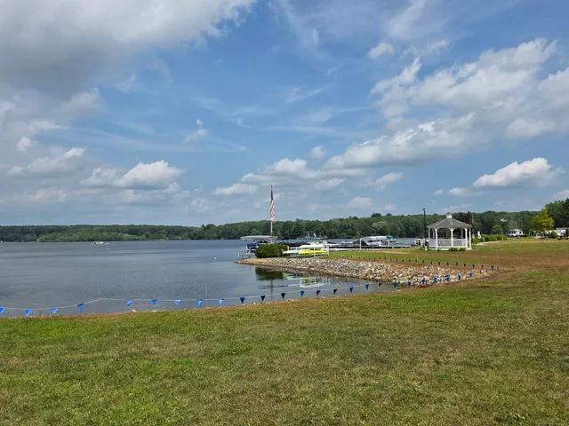 a view of a lake with a big yard