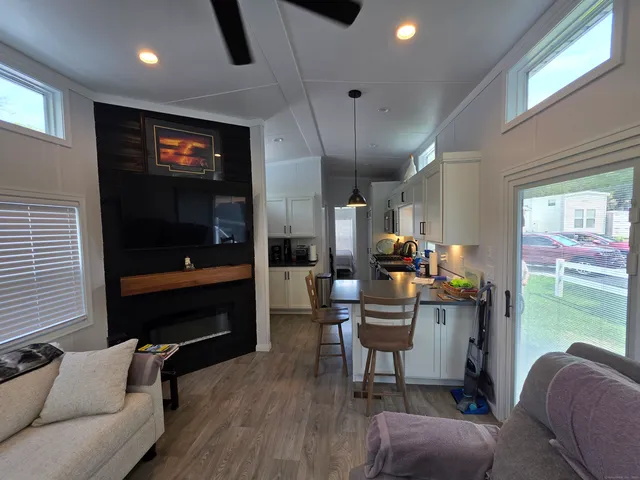 a room with furniture and a flat screen tv