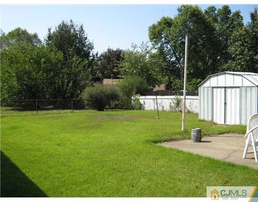 31 Purdue Road Old Bridge, NJ 08859 - Photo 6 of 6 a view of a garden with basketball court
