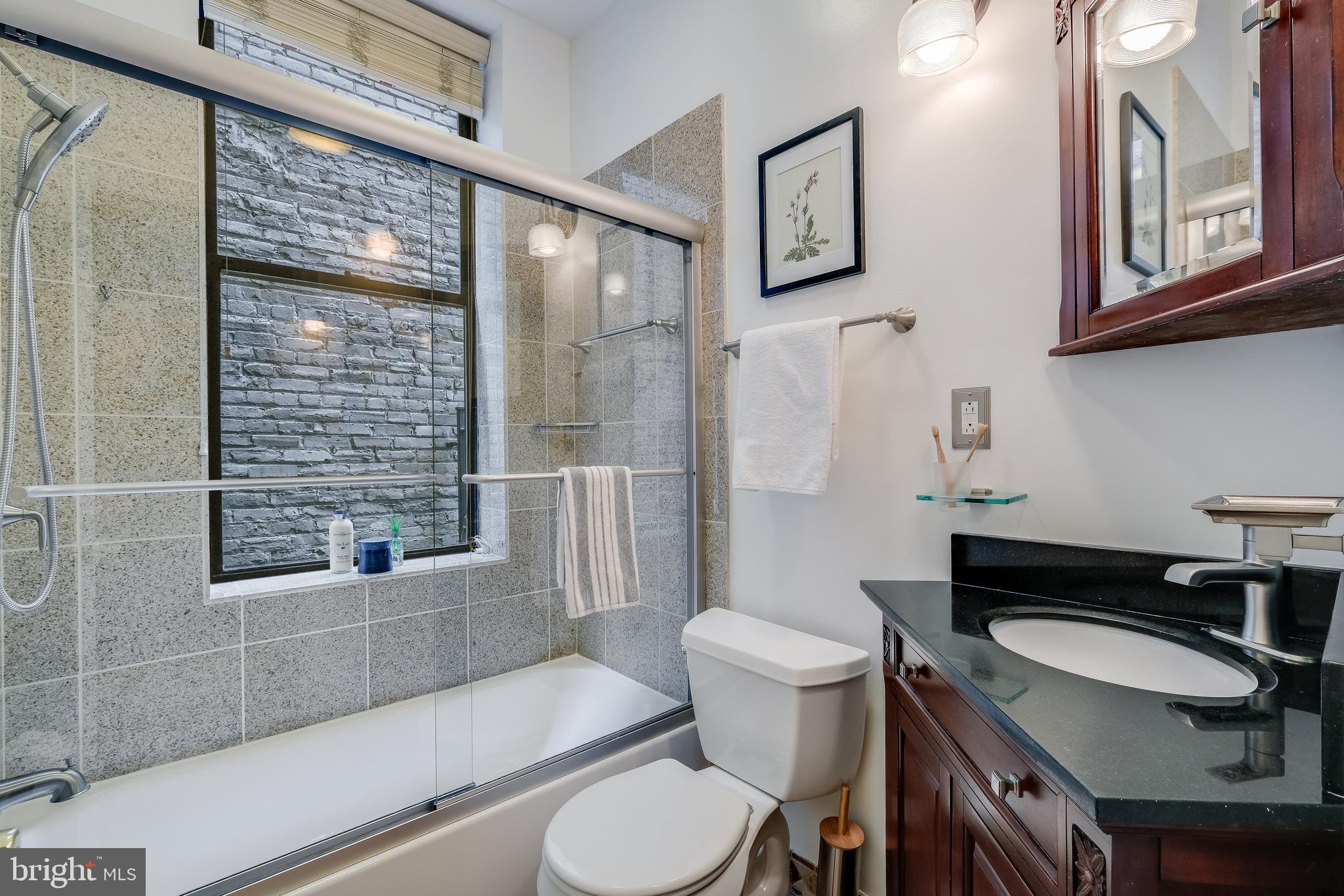 1326 R Street Northwest, Unit 2 Washington, DC 20009 - Photo 14 of 15 Second full bath with tub/shower